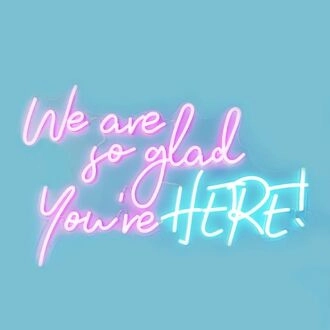 We Are So Glad Youre Here Neon Sign creates a welcoming atmosphere
