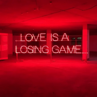 Love is a Losing Game: Embrace the Bittersweet with Neon Ambiance