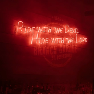 Ride with the Devil, Hide with the Lord: Captivating Neon Art Sign!
