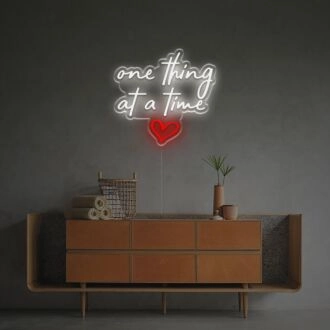 Brighten Up Your Office, Bar, or Home Decor with the One Thing At A Time LED Neon Sign.