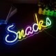Brighten your kitchen or snack bar with the vibrant Snack LED Neon Sign.