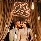 Add a Romantic Glow to Your Bedroom, Wedding, or Anniversary Celebration with the Cuddling Couple Shape Neon Sign.