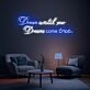 Brighten Your Home, Office, or Special Event with the Inspirational Dream Until Your Dreams Come True Quote Neon Sign.