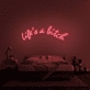 Life's A Bitch' Neon Sign