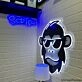 Brighten Your Bar, Office, and Home Decor with the Hip Monkey With Glasses Magic LED UV Neon Sign