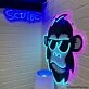 Brighten Your Bar, Office, and Home Decor with the Hip Monkey With Glasses Magic LED UV Neon Sign
