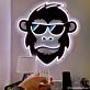 Brighten Your Bar, Office, and Home Decor with the Hip Monkey With Glasses Magic LED UV Neon Sign