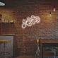 Brighten Up Your Wedding, Bar or Home Decor with the Love By Wordart LED Neon Sign.