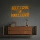 Brighten Your Bedroom, Office, or Yoga Studio with the Self Love Is First Love LED Neon Sign.