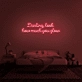 Darling, look how much you glow' neon sign