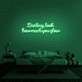 Darling, look how much you glow' neon sign