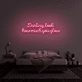 Darling, look how much you glow' neon sign