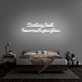 Darling, look how much you glow' neon sign