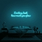 Darling, look how much you glow' neon sign