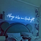 'Always Kiss Me Goodnight' neon sign