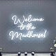 'Welcome To The Madhouse' Neon Sign