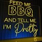Brighten Up Your Kitchen or Backyard Bash with the "Feed Me BBQ and Tell Me I'm Pretty" LED Neon Sign