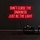 Dont Curse The Darkness Be The Light Neon Sign