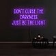 Dont Curse The Darkness Be The Light Neon Sign