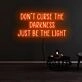 Dont Curse The Darkness Be The Light Neon Sign