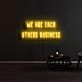 We Are Each Others Business Neon Sign