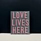 Love Lives Here Neon Sign