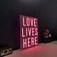 Love Lives Here Neon Sign