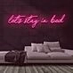 Stay in Bed Neon Sign