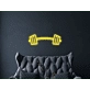 Barbell Neon Sign Hung On The Wall Of A Room