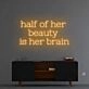Half of her beauty' neon sign