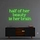 Half of her beauty' neon sign