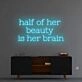 Half of her beauty' neon sign