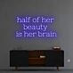 Half of her beauty' neon sign