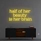 Half of her beauty' neon sign