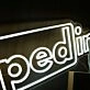 Tapped In Neon Sign