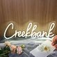 Creekbank White Neon Sign
