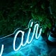 In The Air Blue Neon Sign