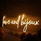 Love And Bijoux Yellow Neon Sign