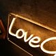 Love Grows Yellow Neon Sign