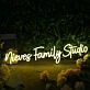 Niever Family Studio Yellow Neon Sign