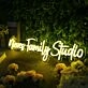 Niever Family Studio Yellow Neon Sign
