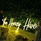 The Honey Hive Yellow Neon Sign
