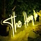 The Honey Hive Yellow Neon Sign