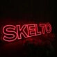 SKELTO Red Noen Sign