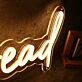 Head Yellow Neon Sign