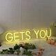 GETS YOU Yellow Neon Sign