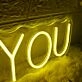 GETS YOU Yellow Neon Sign
