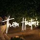 Them Houston's Yellow Neon Sign