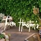 Them Houston's Yellow Neon Sign