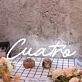 Cuatro White Neon Sign